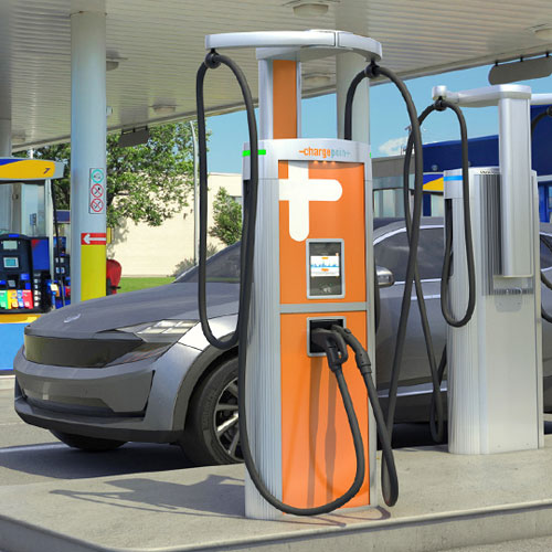 Charging electric vehicle at convenient store with gas fueling vehicles